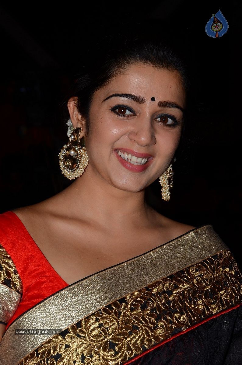 Charmi at Jyothi Lakshmi Audio Launch - 27 / 39 photos