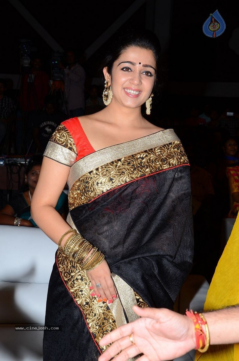 Charmi at Jyothi Lakshmi Audio Launch - 33 / 39 photos