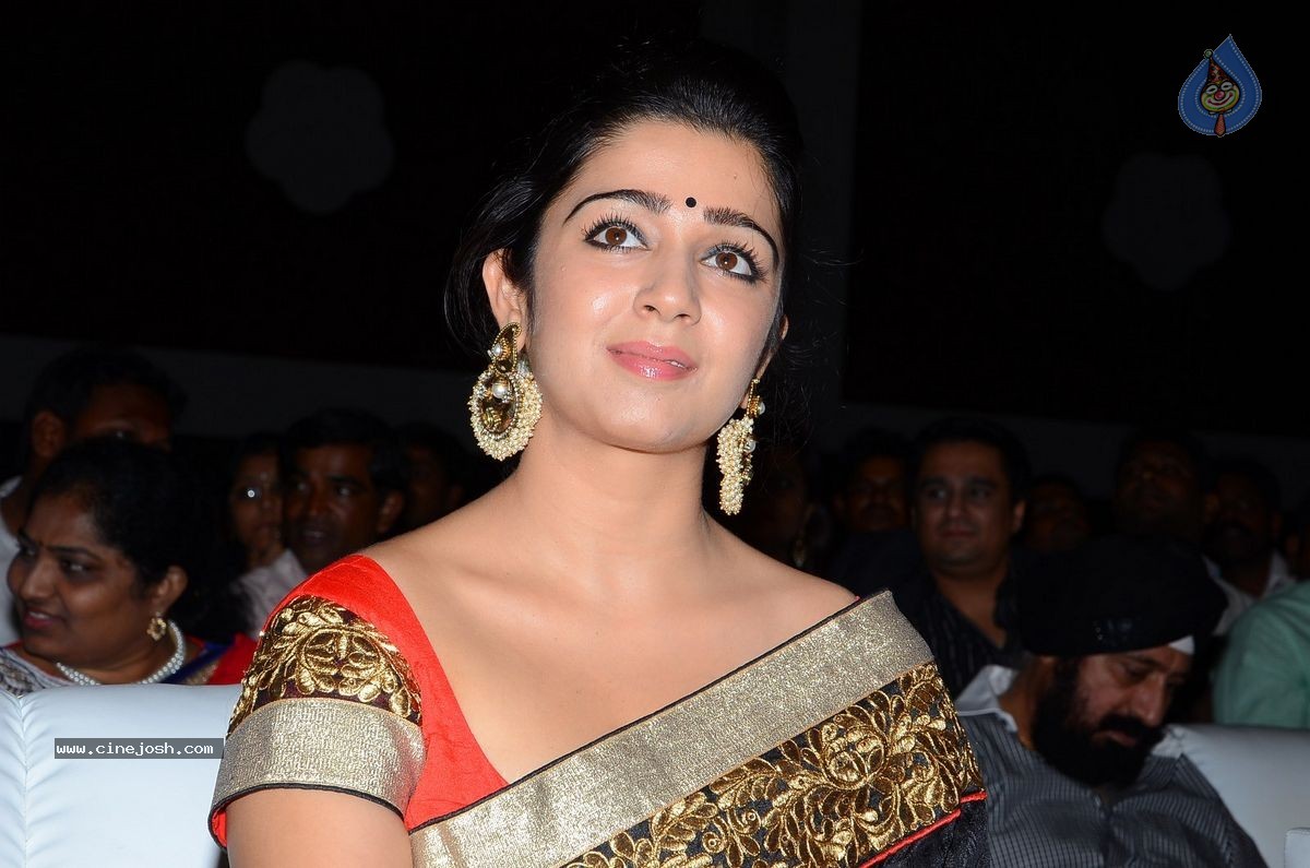 Charmi at Jyothi Lakshmi Audio Launch - 34 / 39 photos