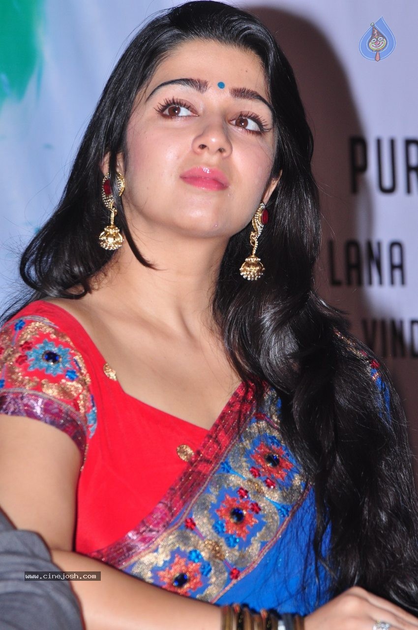 Charmi at Jyothi Lakshmi SM - 31 / 83 photos