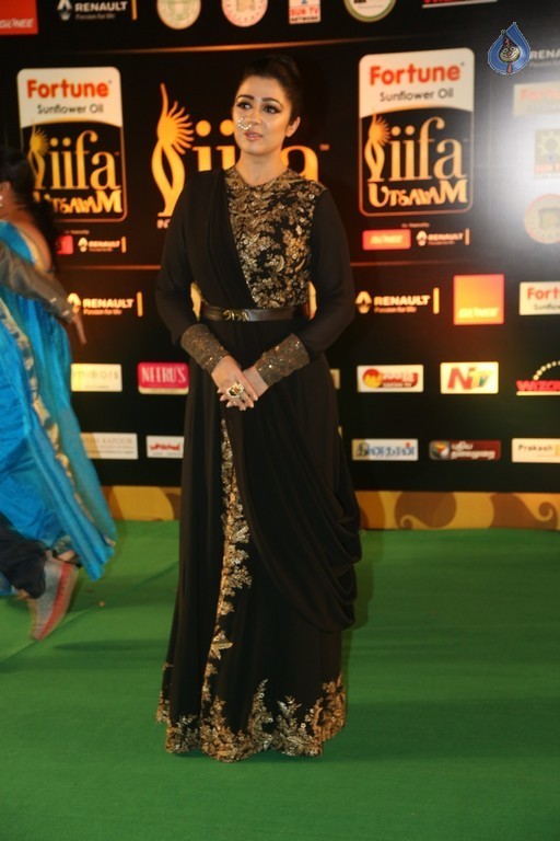 Charmy Kaur New Pics - 13 / 39 photos