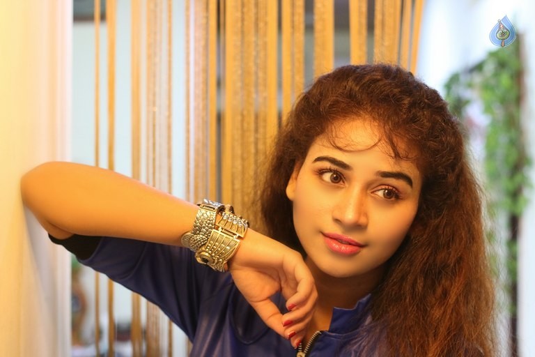 Jayathi New Stills - 7 / 32 photos