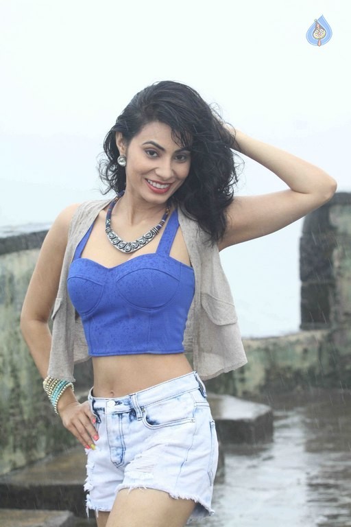 Manisha Kelkar Glamorous Rain Photo Shoot - 25 / 26 photos