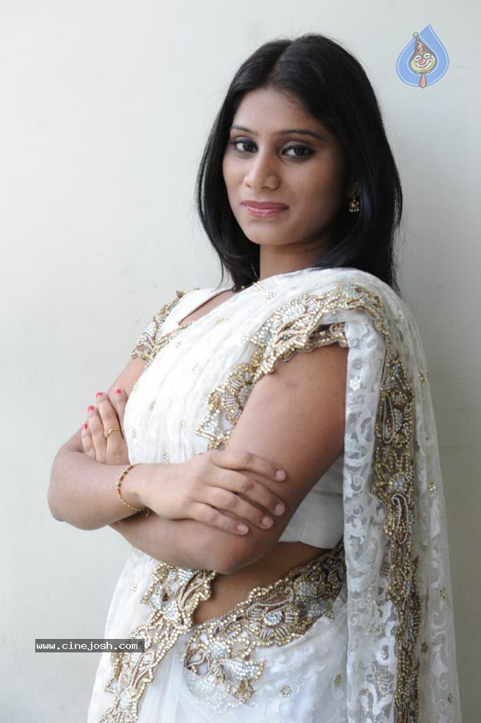 Midhuna New Stills - 23 / 30 photos