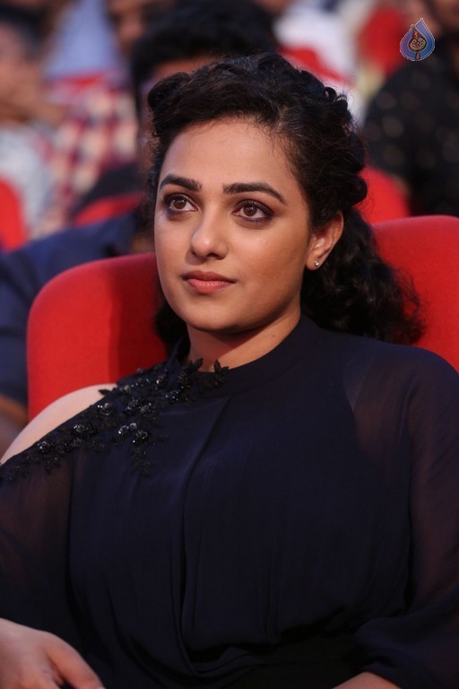 Nithya Menon at Janatha Garage Audio Launch - 31 / 42 photos