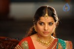 Madhu Sharma In Pravarakyudu Movie Stills - 14 of 26