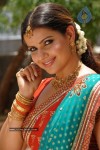 Madhu Sharma In Pravarakyudu Movie Stills - 20 of 26