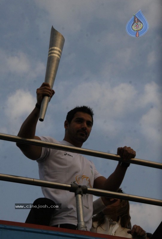John Abraham,Maria Polyzou At Marathon Flame Run - 22 / 25 photos