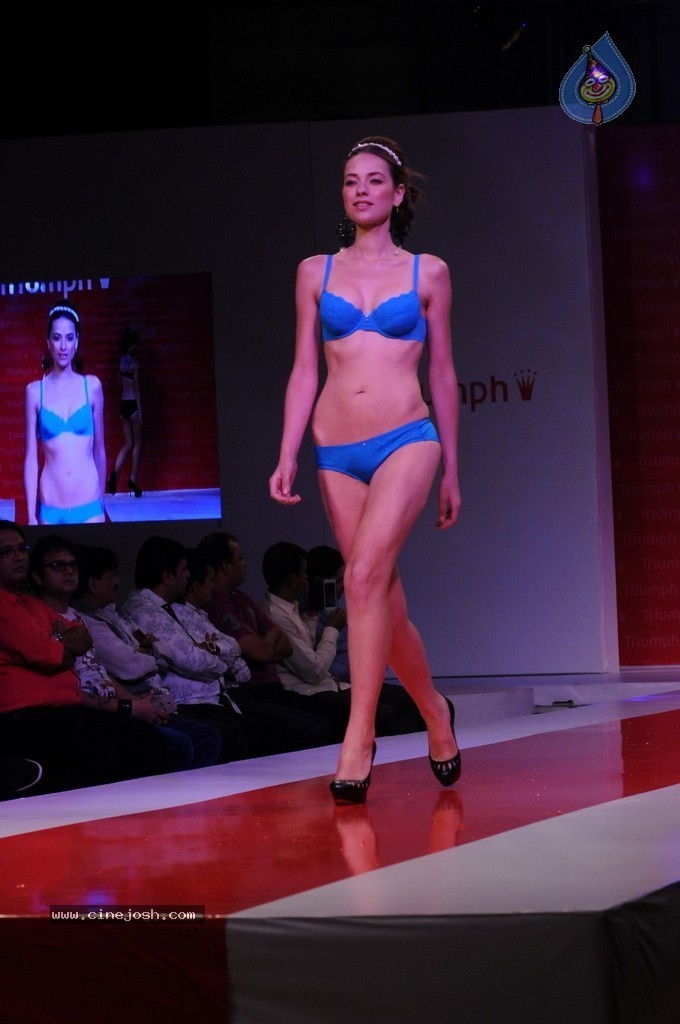 Triumph Bikini Fashion Show - 15 / 32 photos