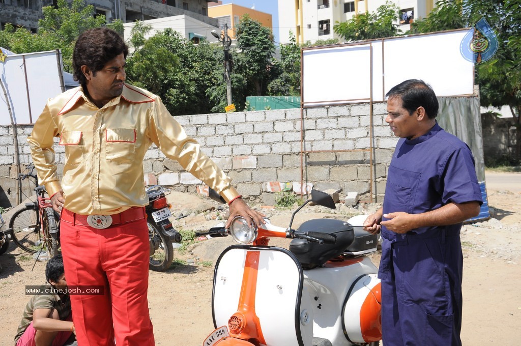 Athadu Aame O Scooter Movie Stills n Posters - 42 / 45 photos