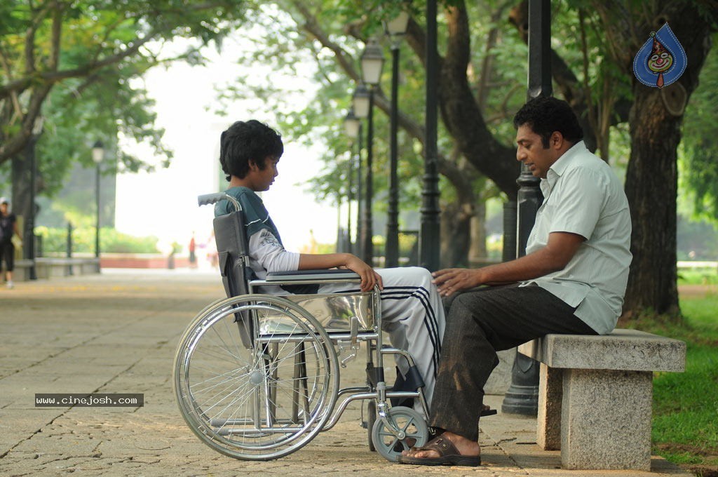 Dhoni Movie Working Stills - 27 / 37 photos