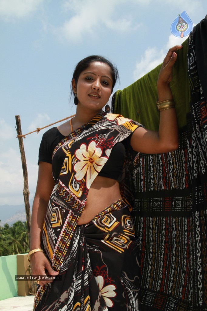 Madhuram Movie Hot Stills - 16 / 32 photos