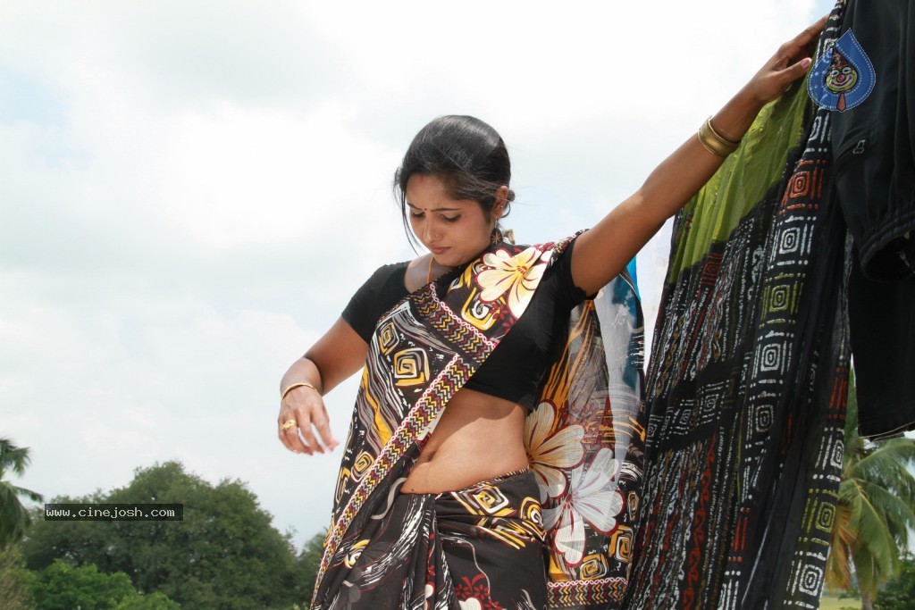 Madhuram Movie Hot Stills - 22 / 32 photos