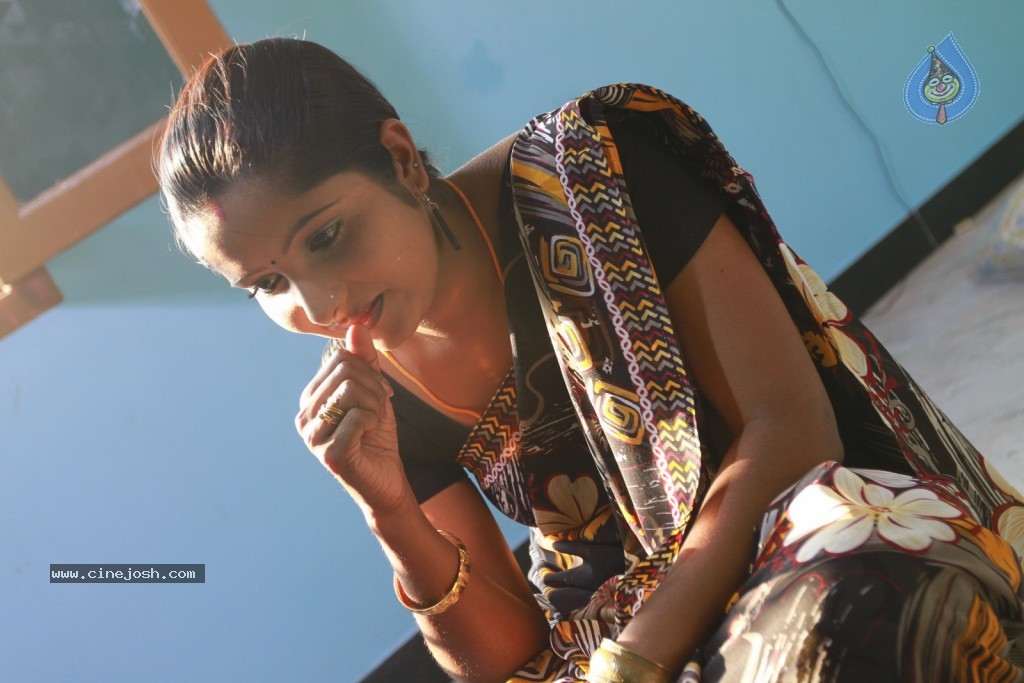 Madhuram Movie Hot Stills - 23 / 32 photos