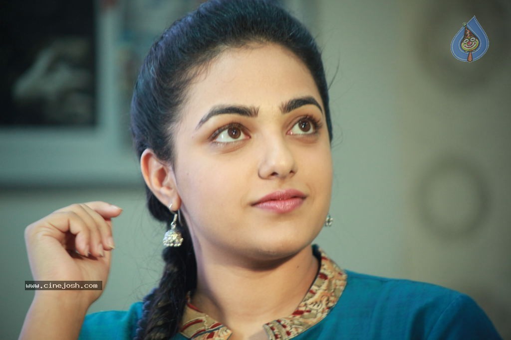 Malini 22 Movie Stills - 1 / 12 photos