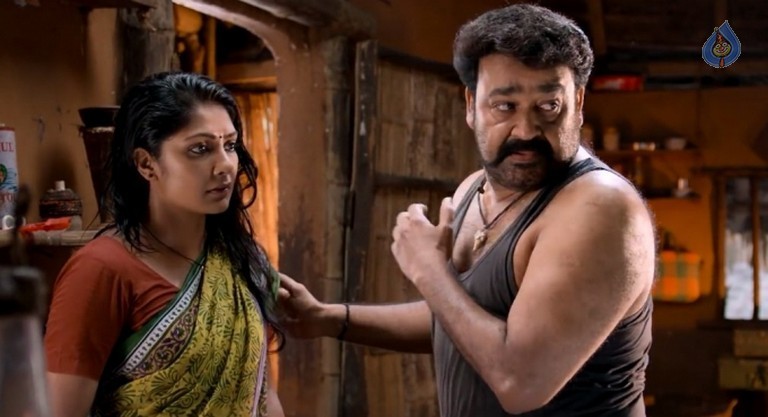 Manyampuli Movie Stills and Posters - 26 / 28 photos