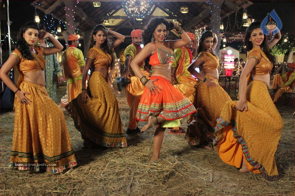 Mumaith Khan Item Song Stills in Aadivaram Amavasya Movie - 19 / 26 photos
