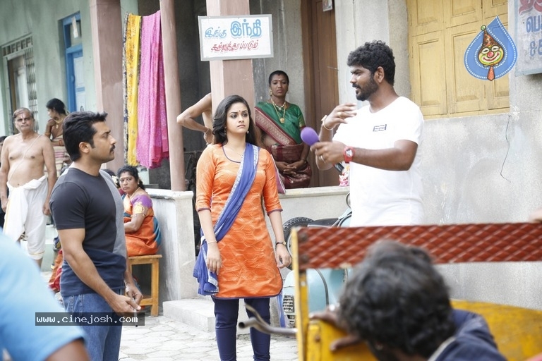 Thaanaa Serndha Koottam Movie Stills - 22 / 28 photos