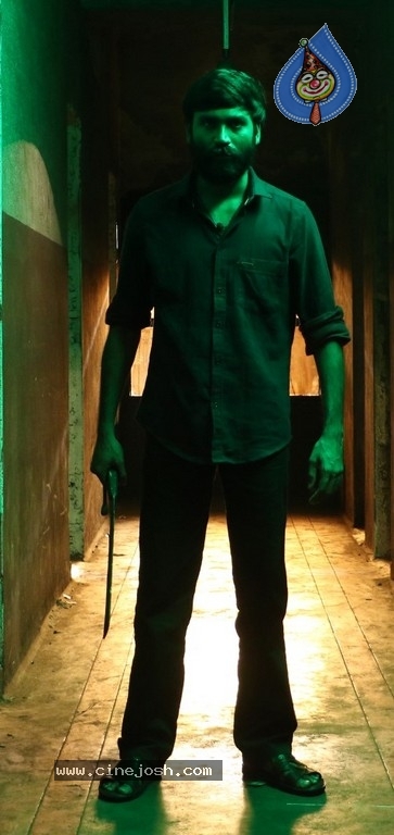 Vada Chennai Movie Stills - 9 / 21 photos