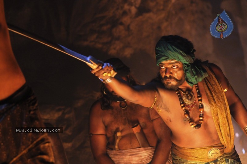 Yuganiki Okkadu Movie Latest Stills - 21 / 35 photos