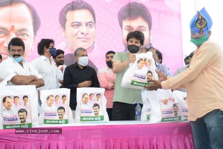 Celebs Distributes Grocery Kits - 11 / 39 photos