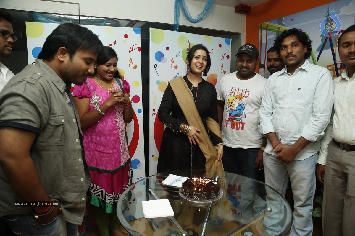 Charmi at Radio City - 15 / 45 photos