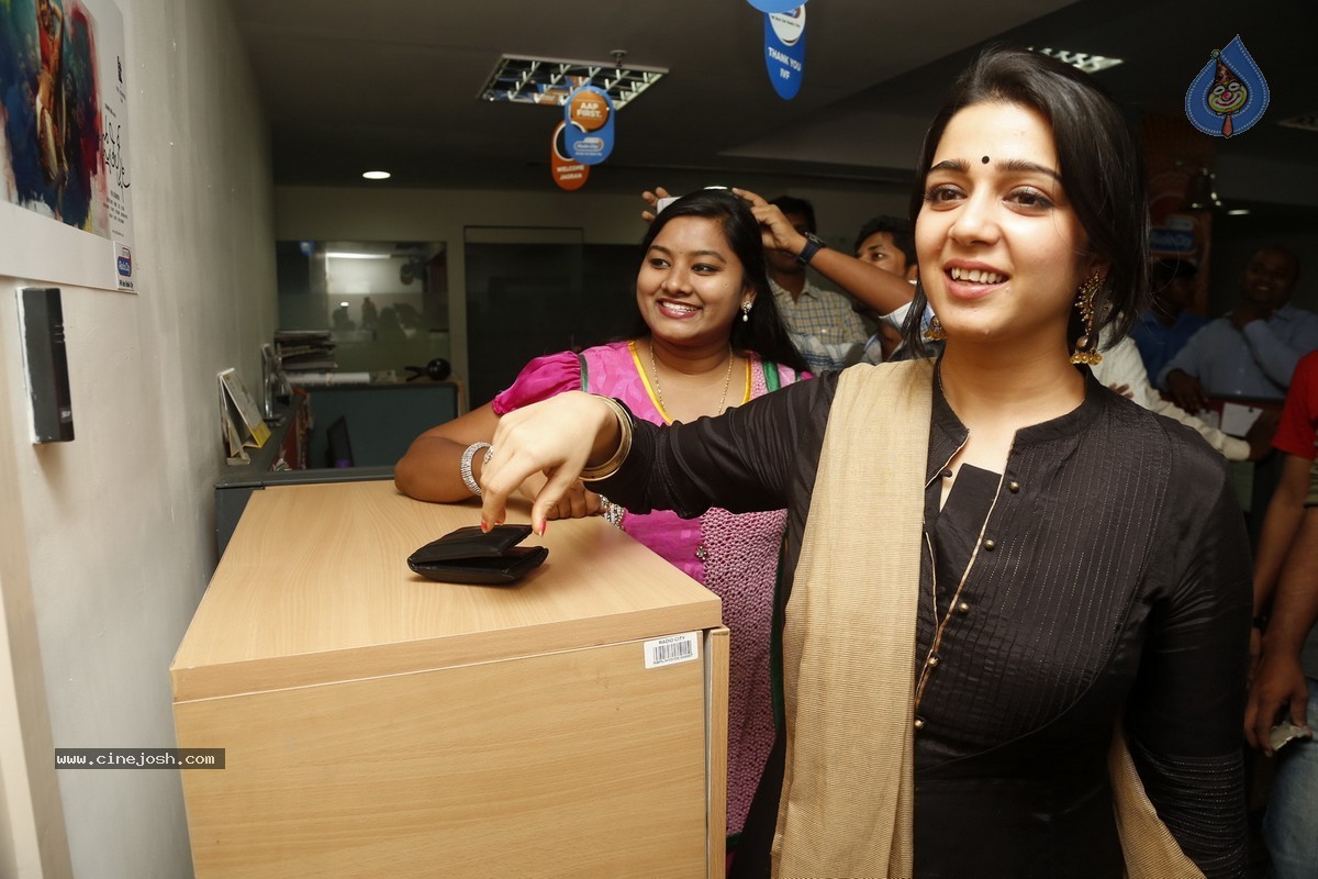 Charmi at Radio City - 19 / 45 photos