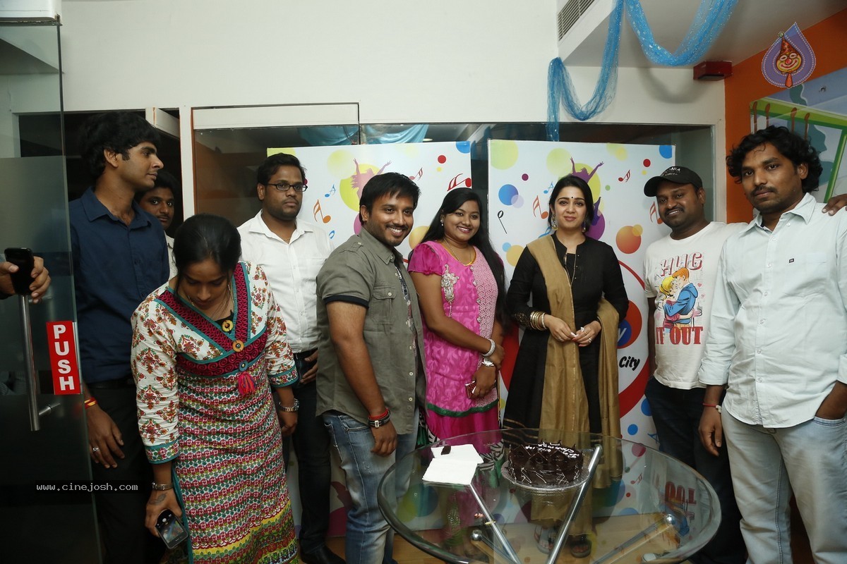 Charmi at Radio City - 22 / 45 photos