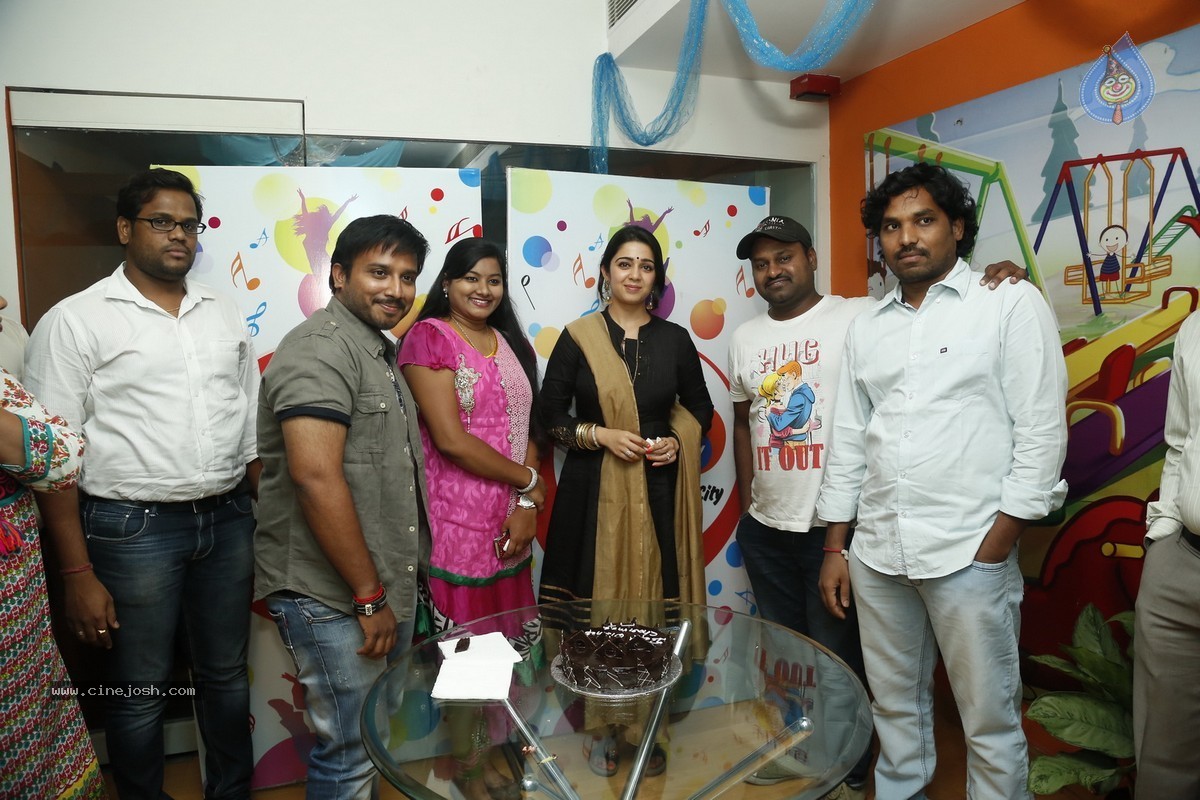 Charmi at Radio City - 34 / 45 photos