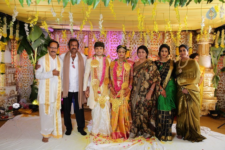 Prabhu Thej and Varsha Wedding Photos - 11 / 13 photos