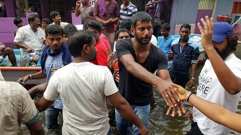 Vishal Supplying Food Packets and Water - 17 / 24 photos