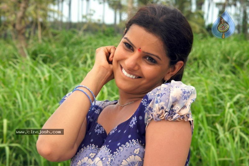 Madhu Sharma Spicy Stills In Wall Poster Movie - 2 / 78 photos