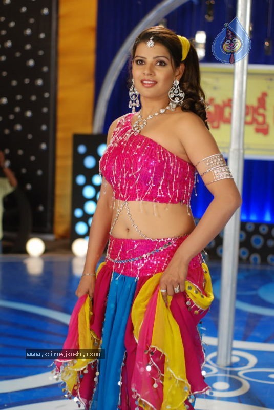 Madhu Sharma Spicy Stills In Wall Poster Movie - 68 / 78 photos