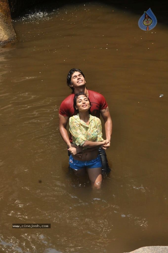 Marumugam Tamil Movie New Hot Stills - 33 / 38 photos