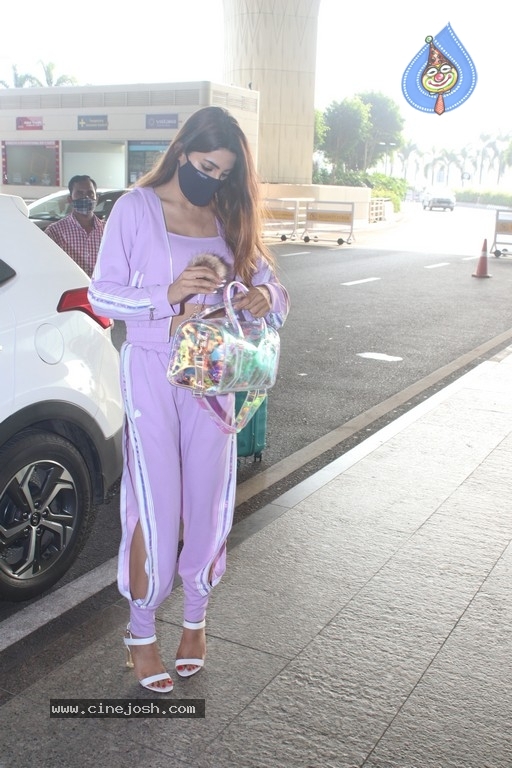 Nikki Tamboli Spotted At Airport - 16 / 17 photos