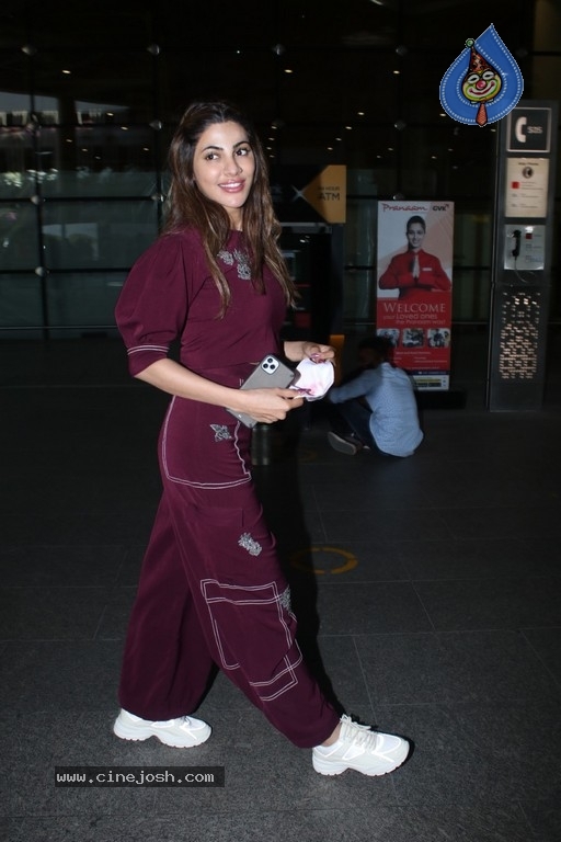 Nikki Tamboli Spotted At Airport - 18 / 19 photos