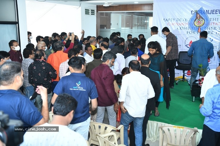 Megastar Distributes Health Cards Photos - 15 / 31 photos