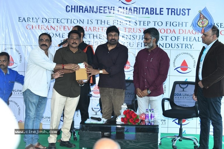 Megastar Distributes Health Cards Photos - 28 / 31 photos